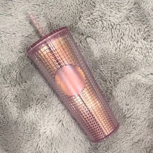 Pink grid Starbucks cup